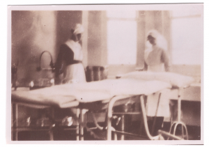 Photograph of two nurses in the operating theatre at Warren Road Hospital